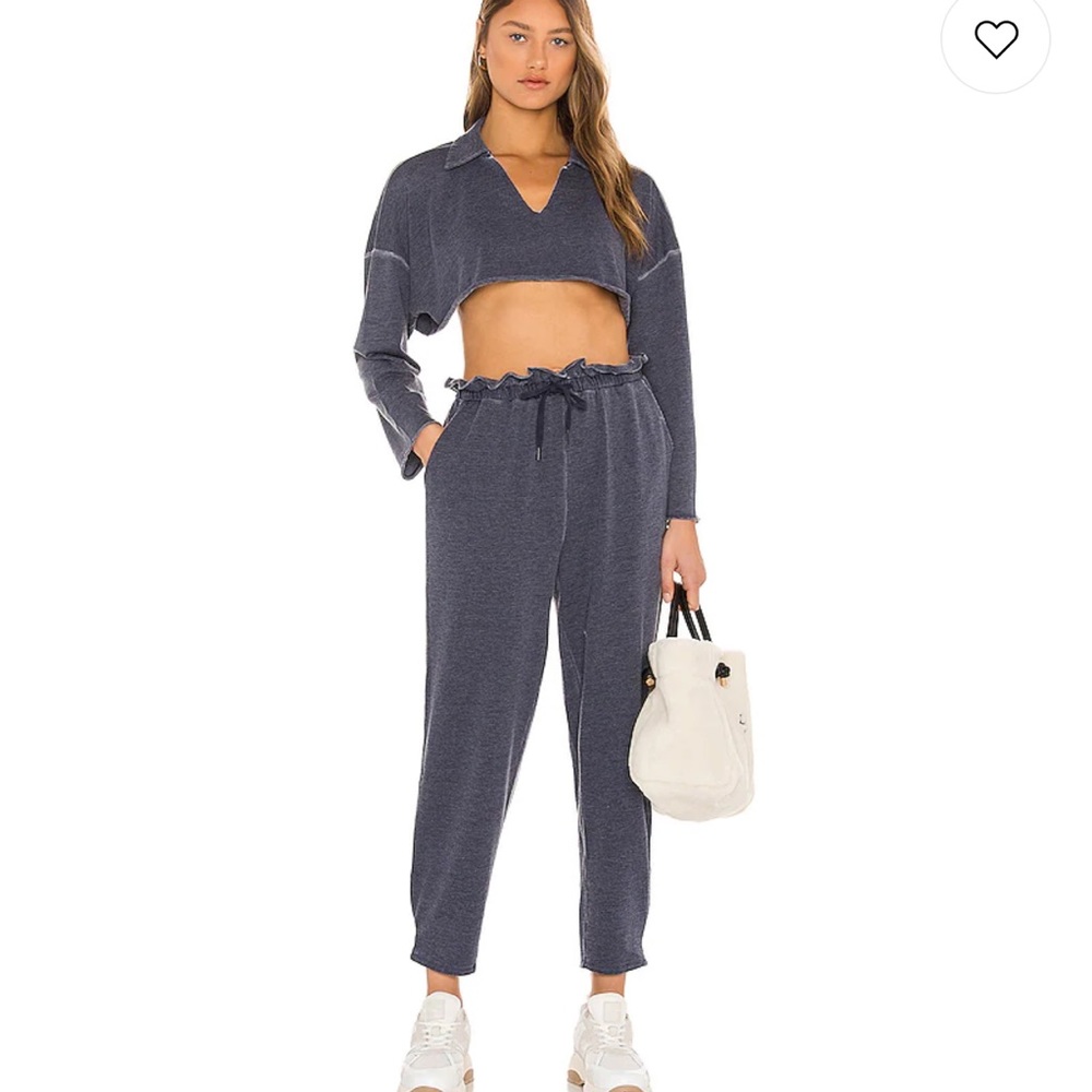 top and pants! Top is a size small and sweatpants are in XS. It’s in silver